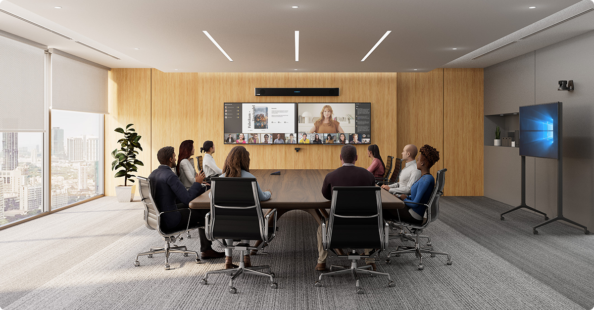 People in room with using a Nureva HDL310 audio conferencing system